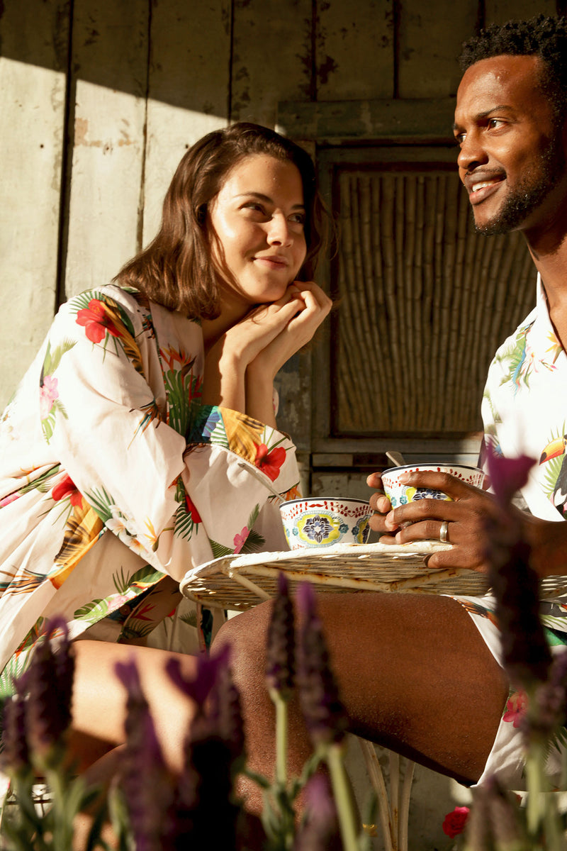 Romantic couple enjoying breakfast wearing Woodstock Laundry garments